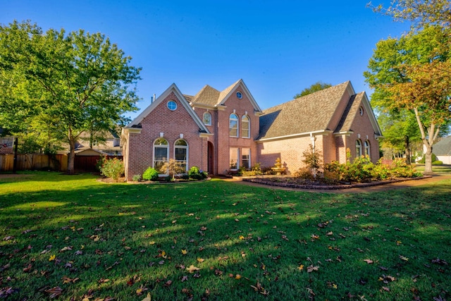 front facade with a front lawn