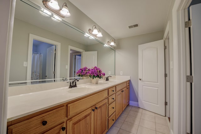 bathroom featuring vanity and tile patterned floors