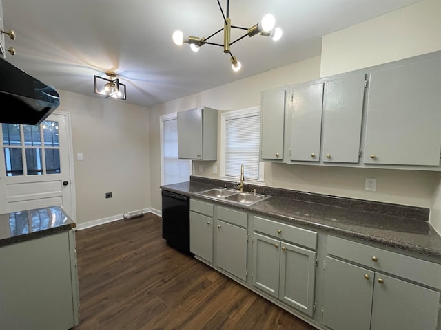 kitchen featuring dark hardwood / wood-style flooring, gray cabinetry, sink, an inviting chandelier, and dishwasher