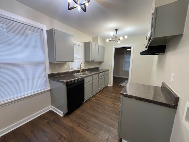 kitchen with gray cabinetry, sink, a chandelier, black dishwasher, and dark hardwood / wood-style floors