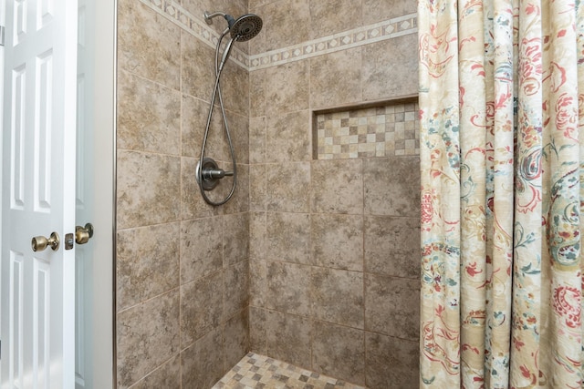 bathroom with a shower with curtain