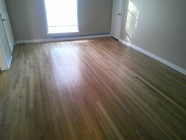 empty room featuring hardwood / wood-style floors