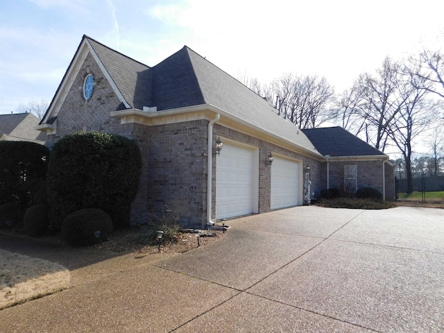 view of property exterior featuring a garage