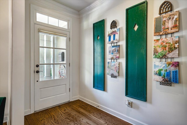 doorway with hardwood / wood-style floors, a healthy amount of sunlight, and ornamental molding