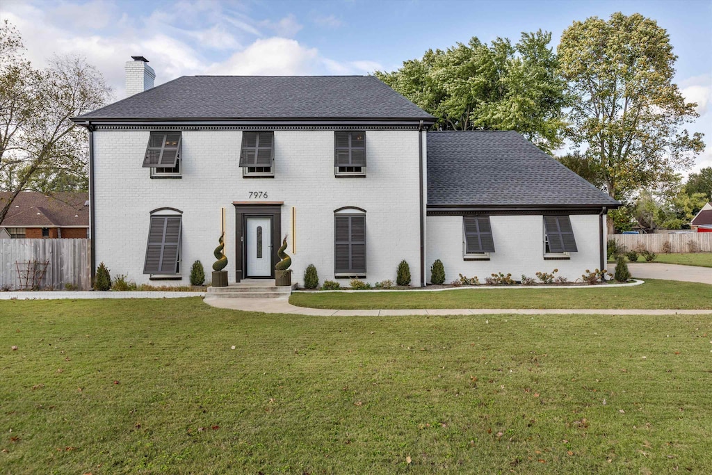 colonial house with a front lawn