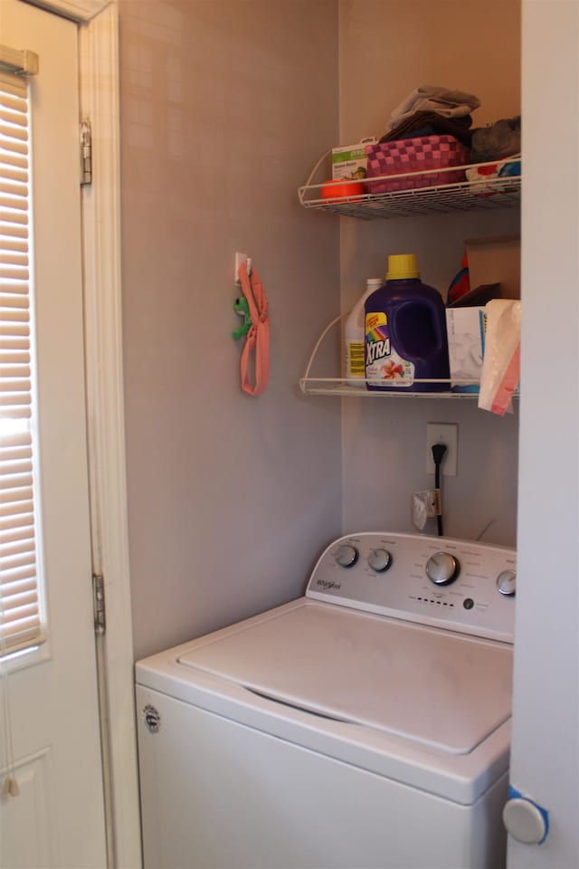 washroom featuring washer / dryer