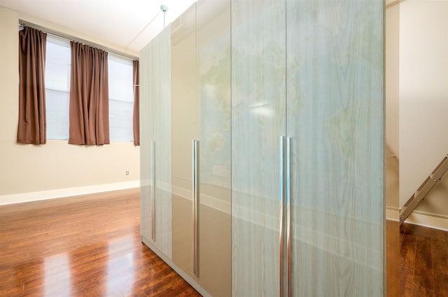 71 Union Ave Unit 102, Memphis, TN 38103 - hallway with wood finished floors and baseboards