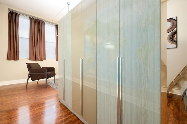 71 Union Ave Unit 102, Memphis, TN 38103 - corridor featuring dark wood-style flooring and baseboards