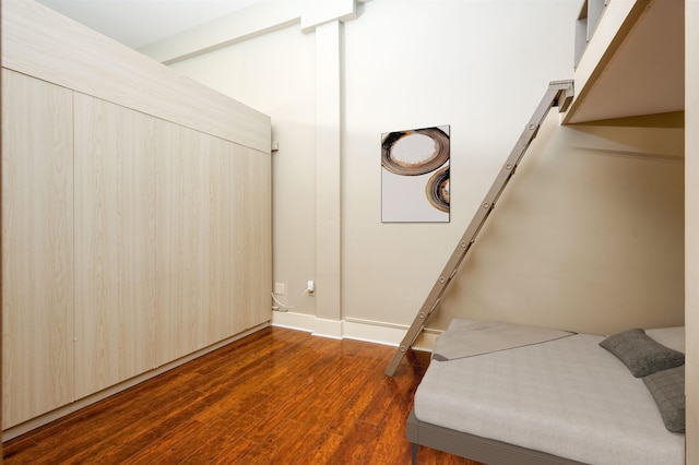 interior space with dark hardwood / wood-style flooring