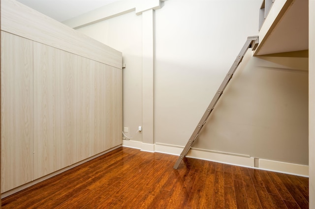 interior space featuring dark wood-type flooring