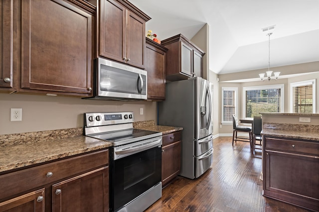 kitchen with appliances with stainless steel finishes, dark brown cabinetry, vaulted ceiling, a notable chandelier, and dark hardwood / wood-style floors