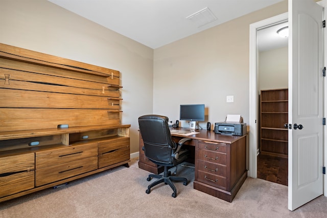 office featuring light carpet