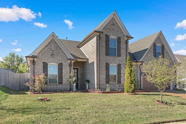 view of front of property with a front lawn