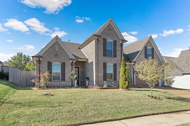 front facade featuring a front yard