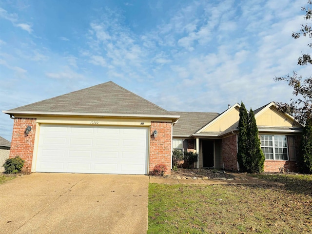 ranch-style house featuring a garage