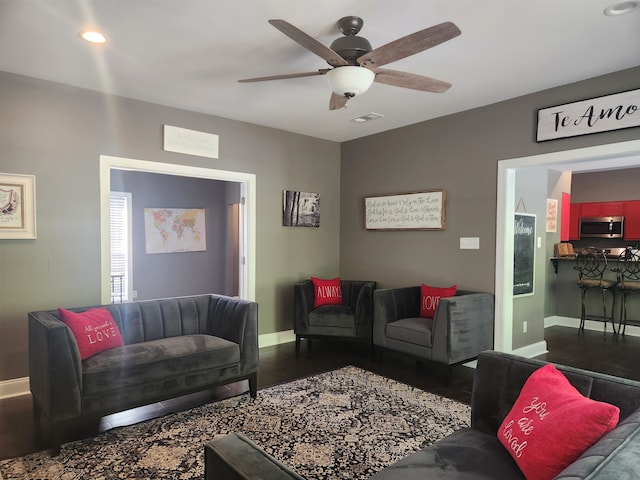 living room featuring ceiling fan