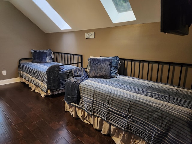 bedroom with hardwood / wood-style floors and lofted ceiling