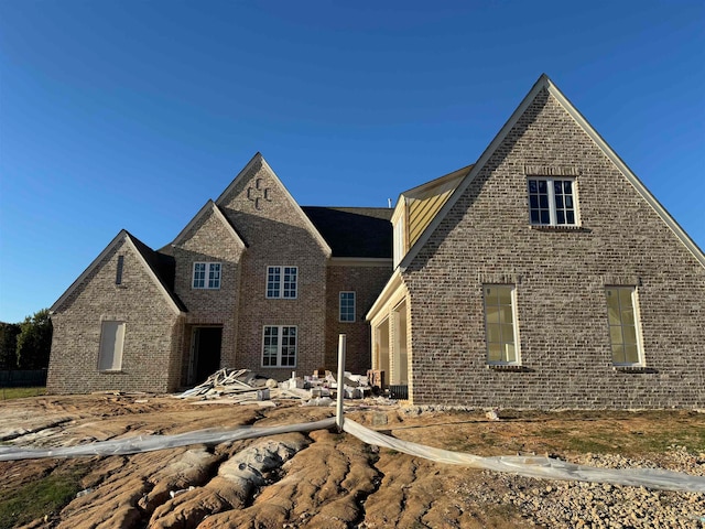 view of front facade featuring brick siding