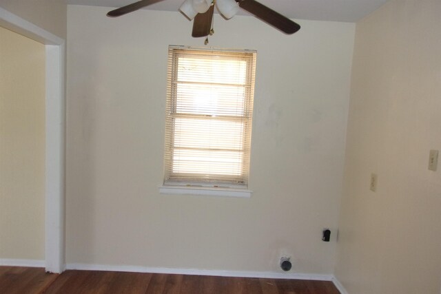 interior space with ceiling fan, dark wood-type flooring, and hookup for an electric dryer