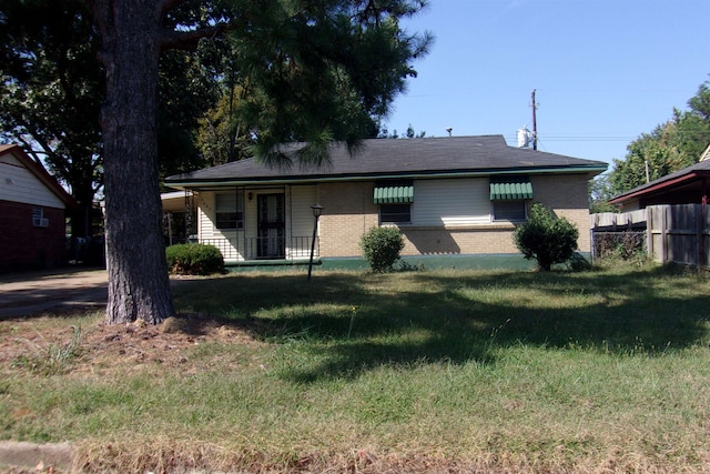 ranch-style house with a front yard