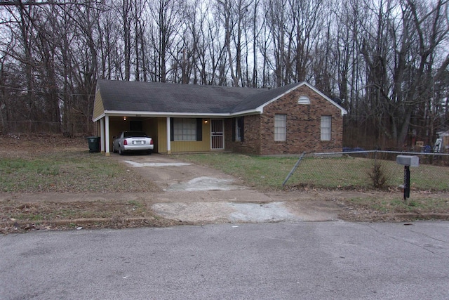 single story home with a carport