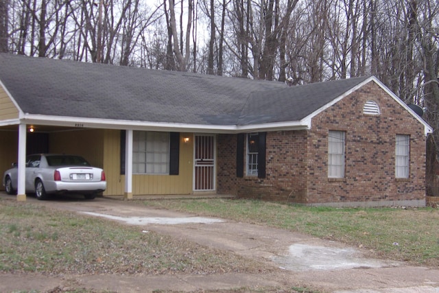 3516 Suzanne Dr, Memphis, TN 38127 - ranch-style home with driveway, brick siding, and a carport