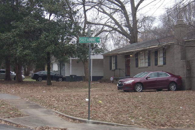 3516 Suzanne Dr, Memphis, TN 38127 - view of front of property with brick siding and a chimney