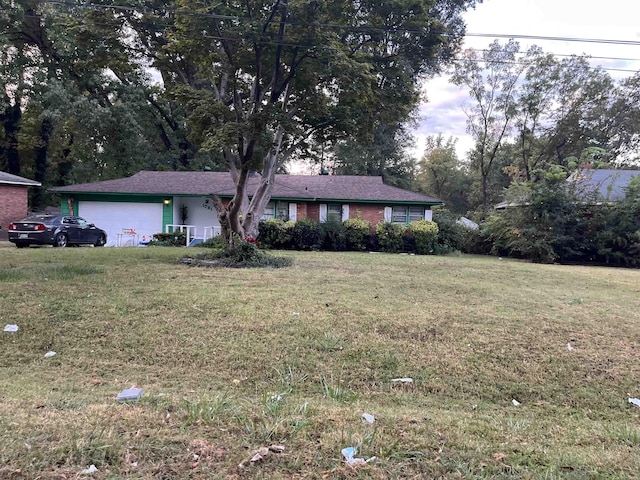 1781 Woodburn Dr, Memphis, TN 38127 - single story home featuring a garage and a front yard