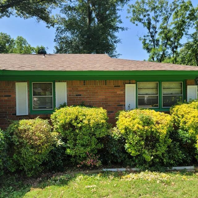 1781 Woodburn Dr, Memphis, TN 38127 - view of side of home featuring brick siding