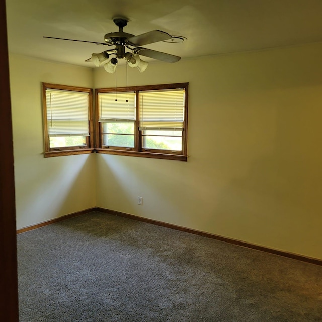 carpeted empty room with ceiling fan