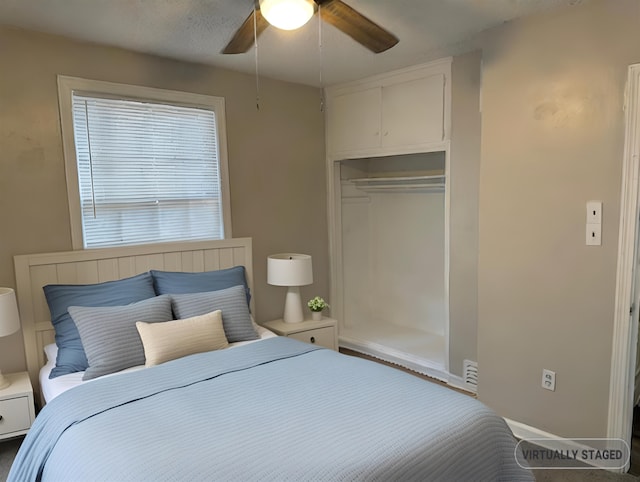 bedroom featuring a closet and ceiling fan