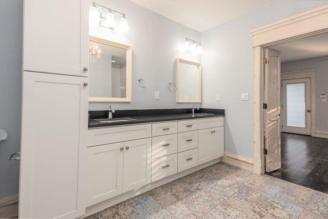 bathroom featuring hardwood / wood-style floors and vanity