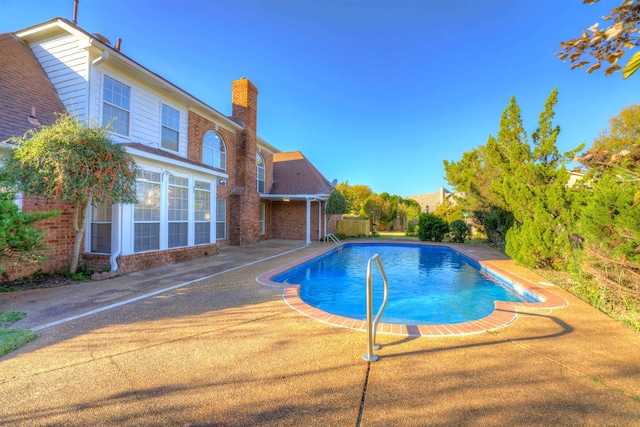 view of pool with a patio