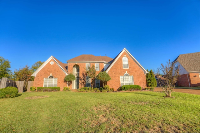 view of front property with a front lawn