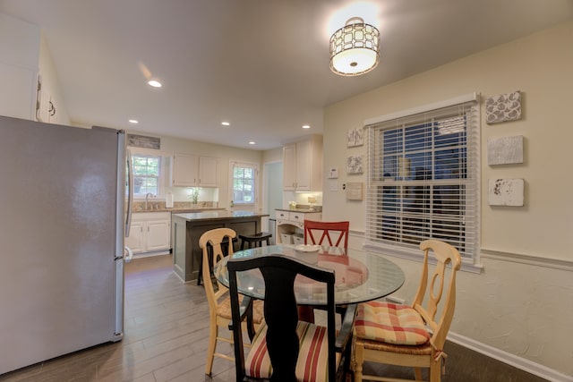 dining space featuring dark hardwood / wood-style flooring