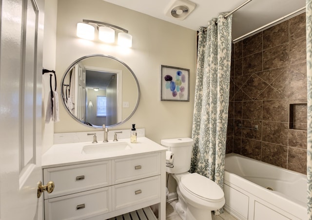 full bathroom featuring toilet, vanity, and shower / tub combo with curtain