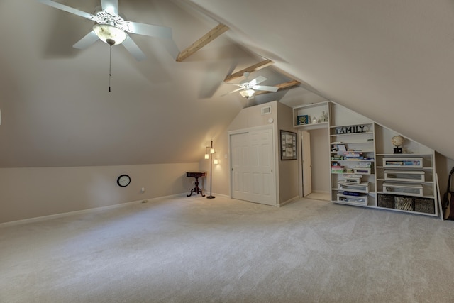 additional living space with carpet flooring, ceiling fan, and lofted ceiling