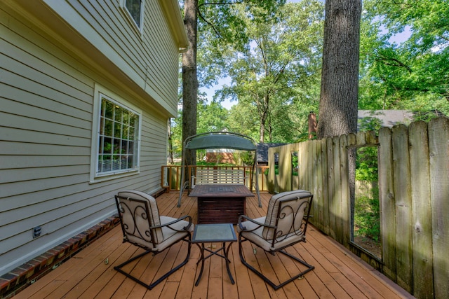 deck with an outdoor fire pit