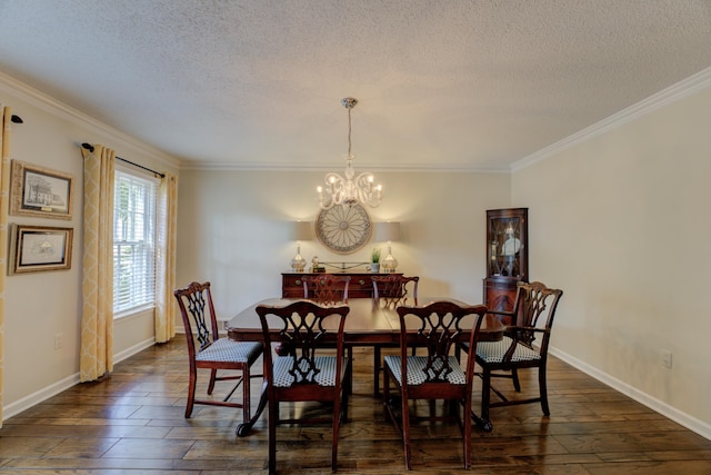 dining area featuring crown molding, dark hardwood / wood-style flooring, a textured ceiling, and a notable chandelier