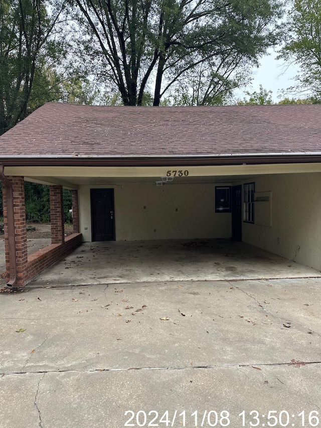 garage with a carport