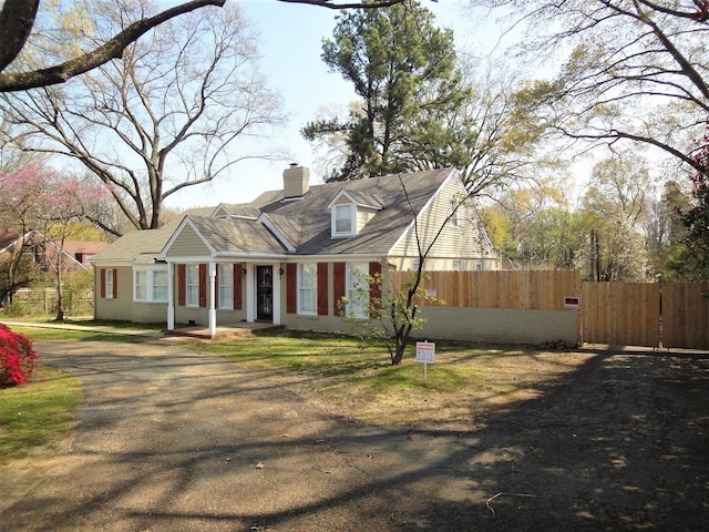 view of new england style home