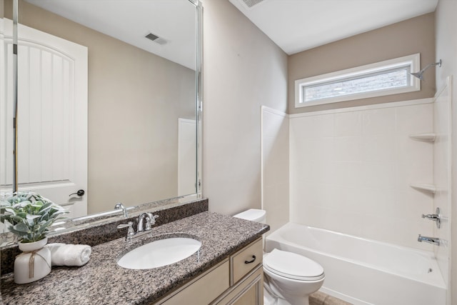 full bathroom featuring vanity,  shower combination, and toilet