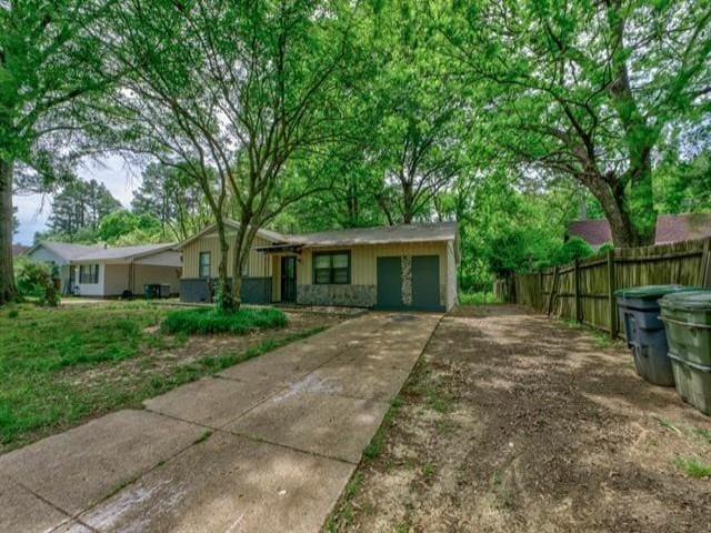 single story home with a garage