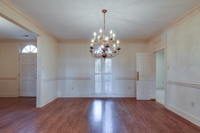 unfurnished dining area featuring ornamental molding, dark hardwood / wood-style floors, and a notable chandelier