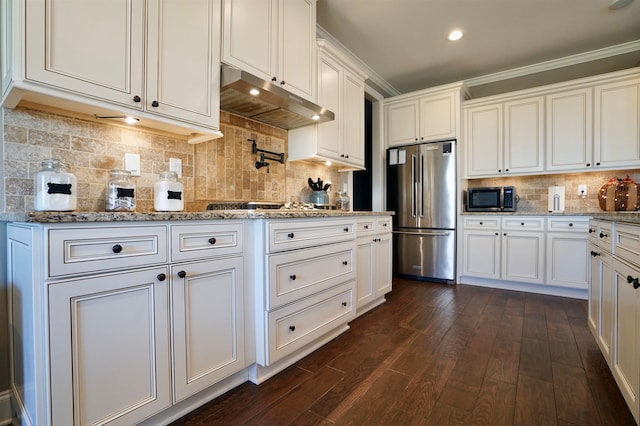 kitchen with white cabinetry, stainless steel appliances, crown molding, and decorative backsplash