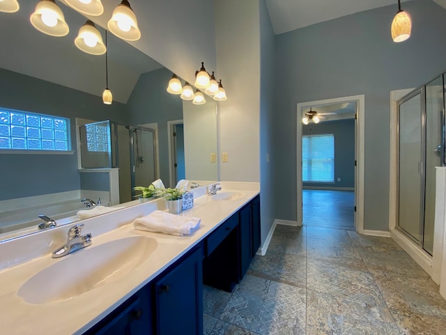 bathroom featuring shower with separate bathtub, vaulted ceiling, plenty of natural light, and ceiling fan