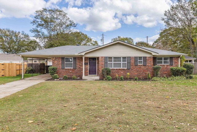 ranch-style home with a front yard and a carport