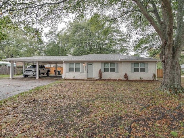 993 Greenview Rd, Collierville, TN 38017 - single story home with driveway, a carport, and brick siding