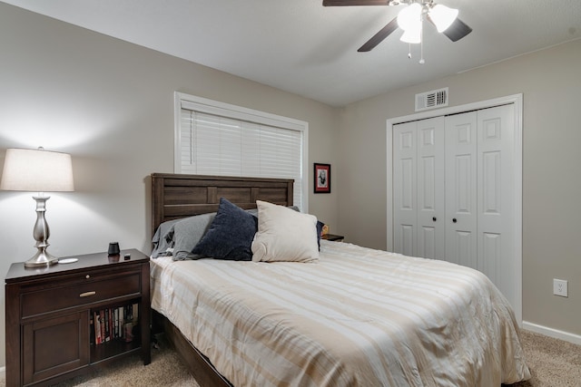 993 Greenview Rd, Collierville, TN 38017 - bedroom with carpet flooring, a closet, baseboards, and ceiling fan