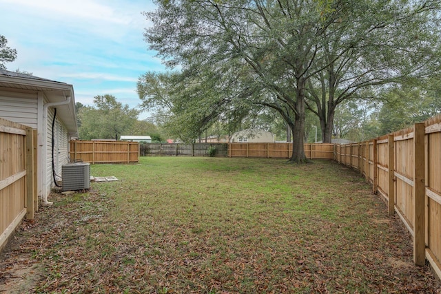 view of yard with central air condition unit